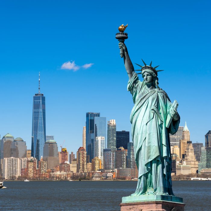 The Statue of Liberty over the Scene of New york cityscape river side which location is lower manhattan,Architecture and building with tourist concept